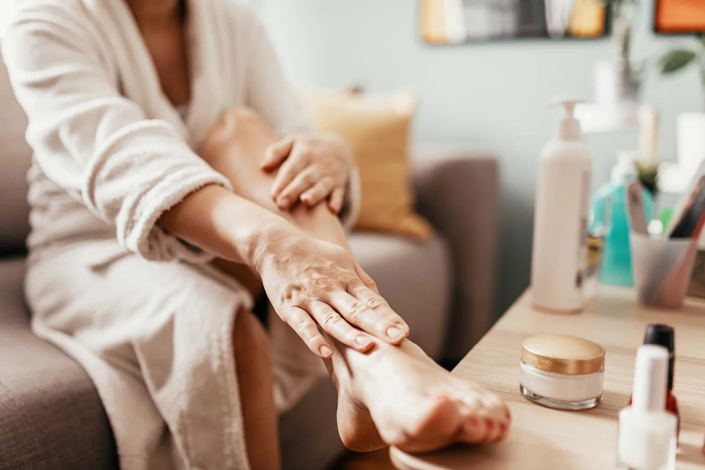 A podiatrist treating a patient's foot in the clinic