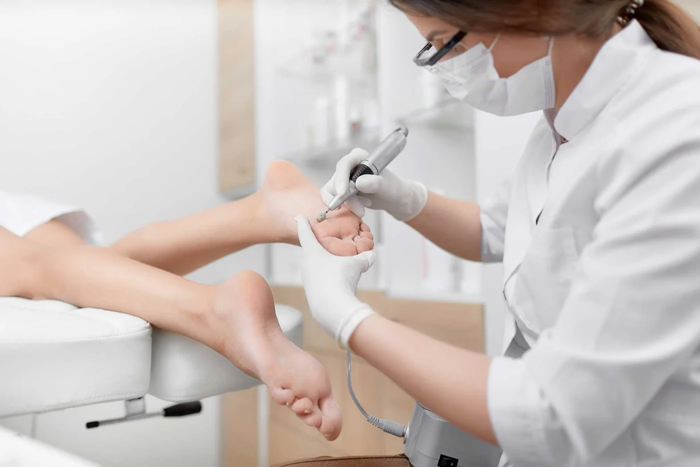 Laser treatment being applied to a patient's foot